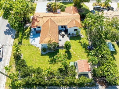 Nestled on a quiet cul-de-sac, 10690 NE 11t Ct offers the - photo 5