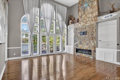 Experience expansive views of Kerr Lake from this impressive - photo 6