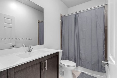 Discover modern living in this stylish 3-bedroom, 2.5-bathroom - photo 14