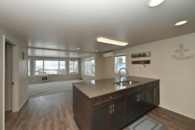 This charming one-story waterfront home on Lake Bruce offers an - photo 15