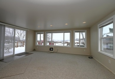 This charming one-story waterfront home on Lake Bruce offers an - photo 17