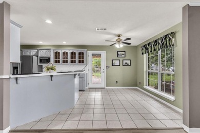 Experience luxury lakeside living in this custom built brick - photo 14