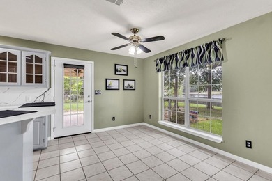 Experience luxury lakeside living in this custom built brick - photo 16