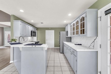Experience luxury lakeside living in this custom built brick - photo 17