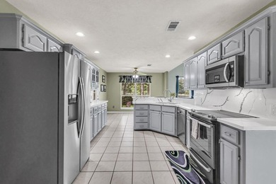Experience luxury lakeside living in this custom built brick - photo 19