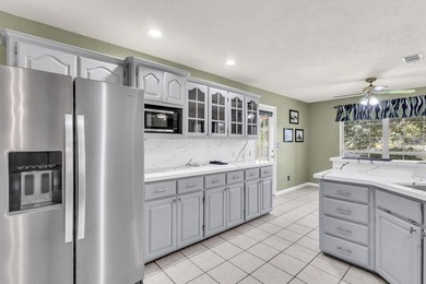 Experience luxury lakeside living in this custom built brick - photo 20