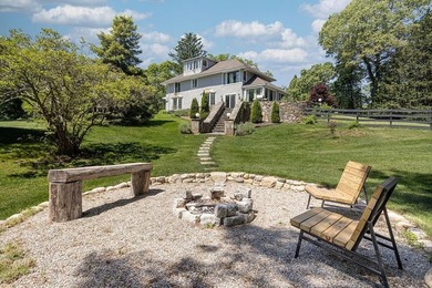 Set behind stone pillars and surrounded by 4.72 acres of - photo 12
