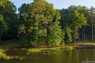 Moderately wooded waterfront lot with plenty of natural light - photo 6
