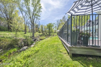 Behind a private tree lined drive in Holcomb Ranch lies a rare - photo 11