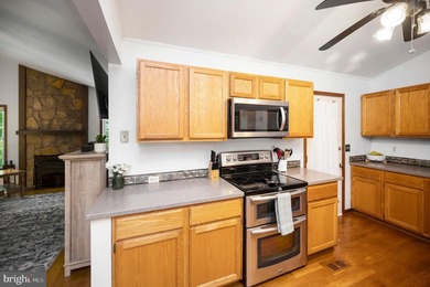 Welcome to 124 Republic Avenue in Lake of the Woods. Discover - photo 15