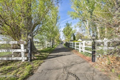 Behind a private tree lined drive in Holcomb Ranch lies a rare - photo 31