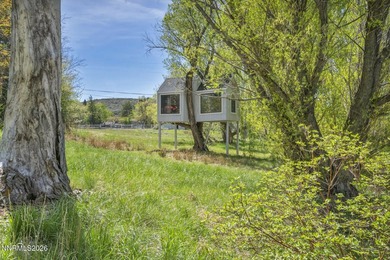 Behind a private tree lined drive in Holcomb Ranch lies a rare - photo 33