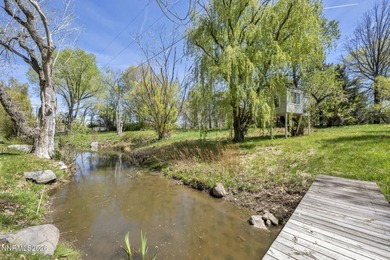 Behind a private tree lined drive in Holcomb Ranch lies a rare - photo 37