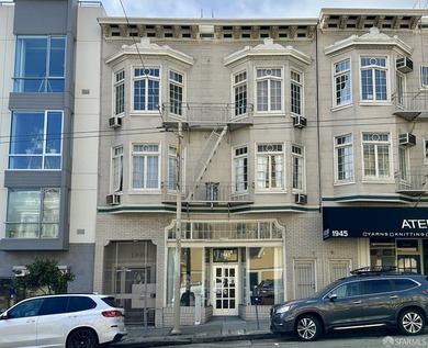 1939 Divisadero Street presents a rare opportunity to acquire a - photo 1
