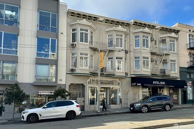 1939 Divisadero Street presents a rare opportunity to acquire a - photo 2