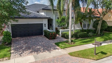 Welcome to this stunning waterfront & single-story residence in - photo 3