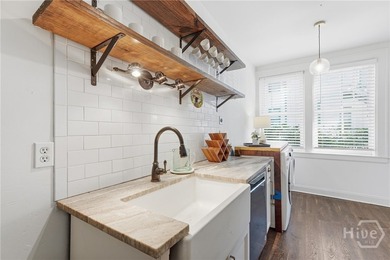 Located on one of Savannah's most sought-after streets, this - photo 4