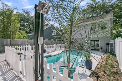 Tucked beneath a canopy of sweeping live oaks, this beautifully - photo 41