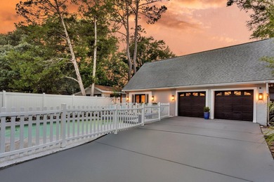 Tucked beneath a canopy of sweeping live oaks, this beautifully - photo 43