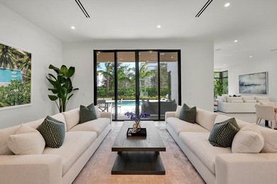 The Laurel Model at The Estates at Morikami Park Road- a refined - photo 4