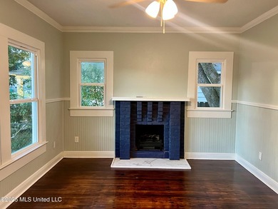 Walk to the beach, park, and community center from this charming - photo 4
