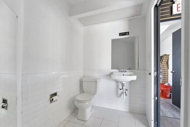 Prime location alert! This free-standing retail building with - photo 8