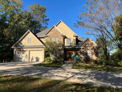 This exceptional 5-bedroom lake retreat in the highly coveted - Lake Home For Sale in Crane Hill, Alabama