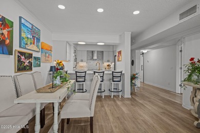 Experience coastal elegance in this beautifully upgraded