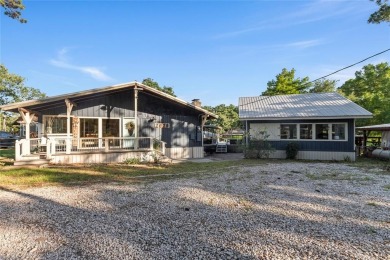 Enjoy water views from both the front and back of this - Lake Home For Sale in Tool, Texas