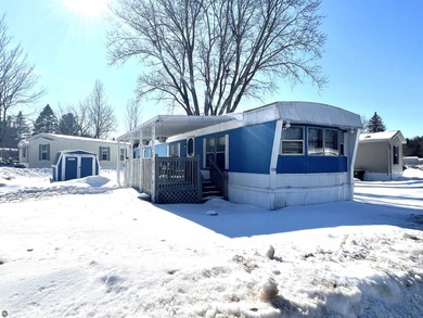 Lake Cadillac Home For Sale in Cadillac Michigan