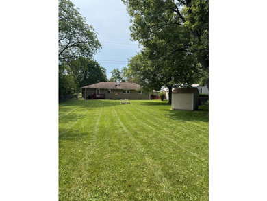 Charming brick ranch in the heart of Hobart. Hardwood floors - photo 5