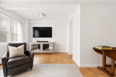 Introducing a rare Upper East Side duplex with two bedrooms and - photo 3