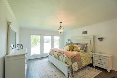 Main lake waterfront with private dock, updated interior, and - photo 14