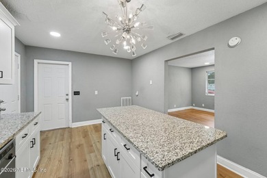 Welcome home to this beautifully updated 3-bedroom, 2-bath brick - photo 14