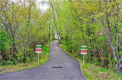 **OPEN BUILDER:** WOODED WALKOUT LAKEVIEW LOT in Forest Hills - photo 16
