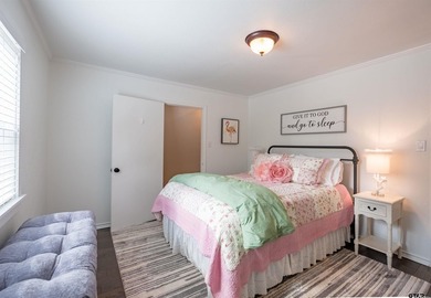 Main lake waterfront with private dock, updated interior, and - photo 19