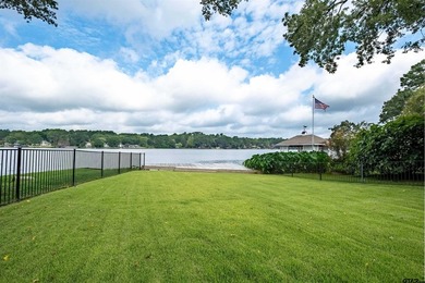 Main lake waterfront with private dock, updated interior, and - photo 26