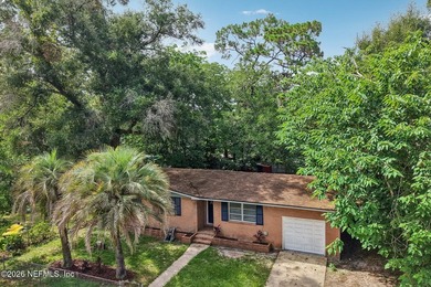 Welcome home to this beautifully updated 3-bedroom, 2-bath brick - photo 31