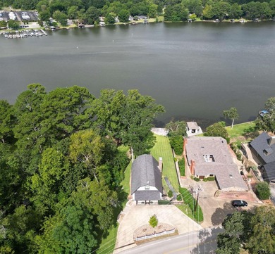 Main lake waterfront with private dock, updated interior, and - photo 36