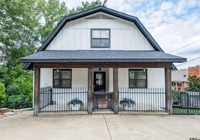 Main lake waterfront with private dock, updated interior, and - photo 38