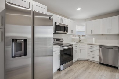 HURRY! THIS UPDATED, BRIGHT, CORNER CONDO IS PRICED BELOW MARKET - photo 2