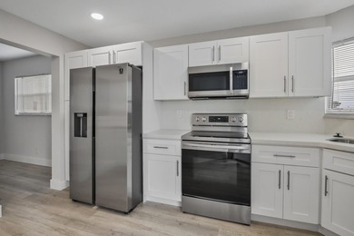 HURRY! THIS UPDATED, BRIGHT, CORNER CONDO IS PRICED BELOW MARKET - photo 3