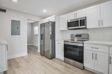 HURRY! THIS UPDATED, BRIGHT, CORNER CONDO IS PRICED BELOW MARKET - photo 5