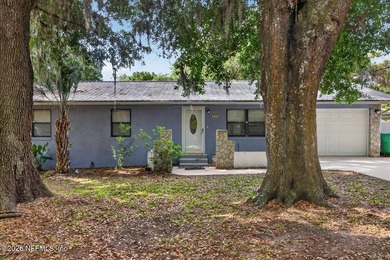 A Little Piece of Old Florida Charm, tucked beneath a canopy of - photo 1