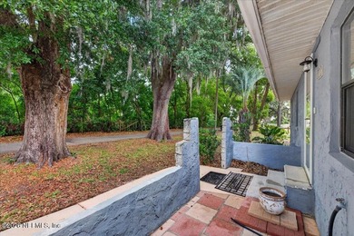 A Little Piece of Old Florida Charm, tucked beneath a canopy of - photo 7