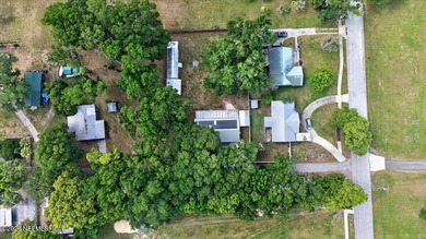 A Little Piece of Old Florida Charm, tucked beneath a canopy of - photo 9