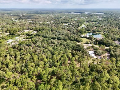 2.5-acre vacant lot situated in desirable Golden Gate Estates - photo 3