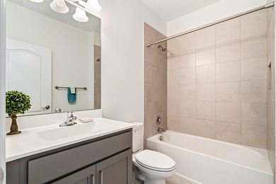 Welcome to this charming 4-bedroom, 3.5-bathroom townhouse in - photo 17
