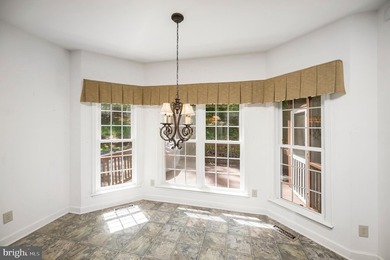 Imagine starting your day on the expansive covered front porch - photo 25