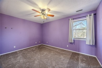 This isn't your typical lake condo-step inside and you'll feel